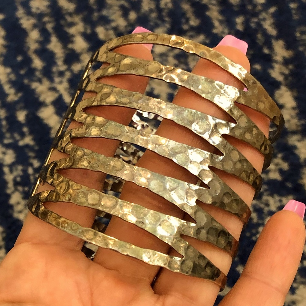 Shiny & slightly tarnished adjustable bracelet. Worn on wrist & above elbow 👑